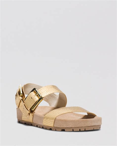 michael kors gold and jean color shoes|Michael Kors gold flat sandals.